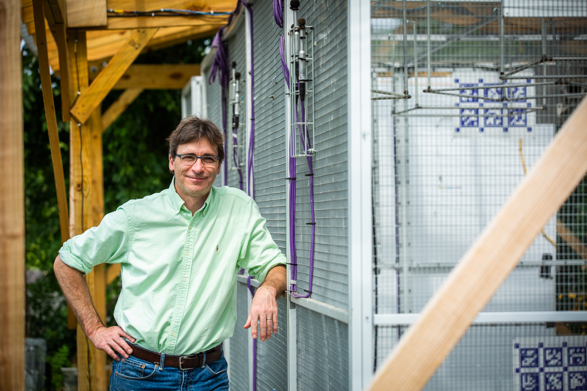 Biology professor Marc Schmidt outside the smart aviary on Pennovation Works campus
