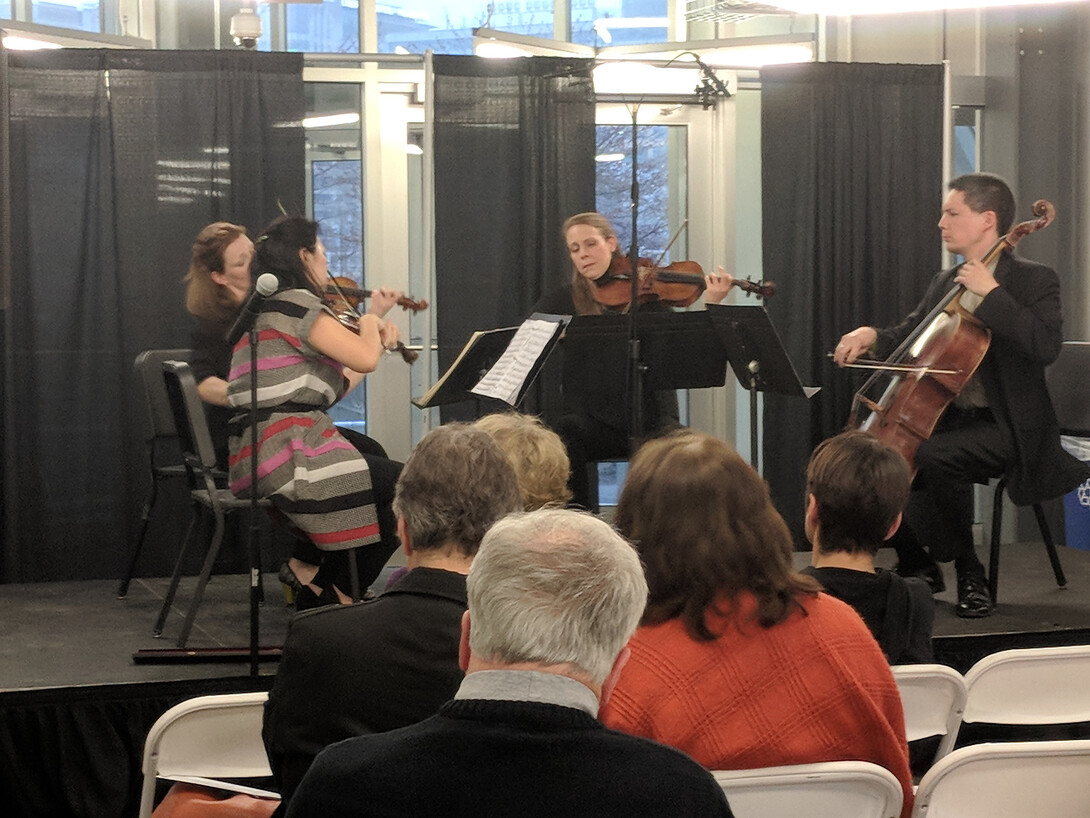 Quartet on stage playing at pennovation center