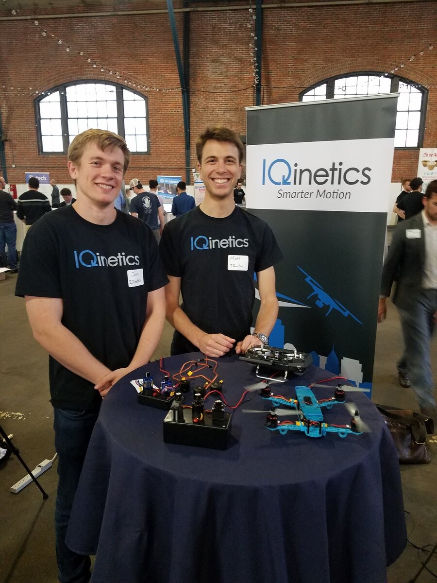 iqinetics team at philly tech week table