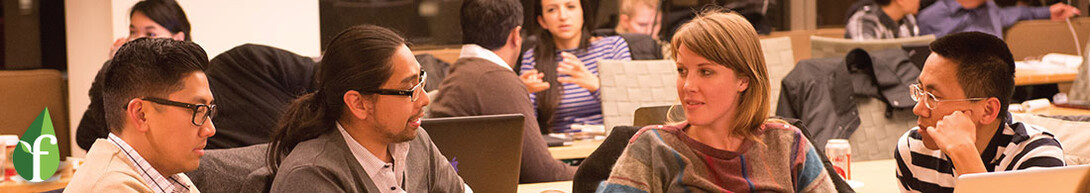 Students chatting at a table